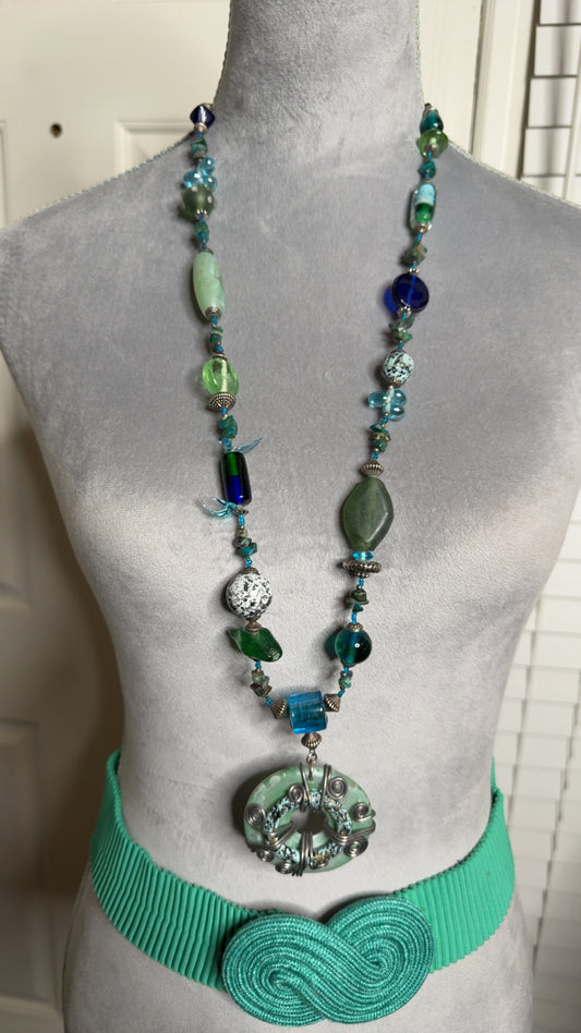 Long necklace with charm